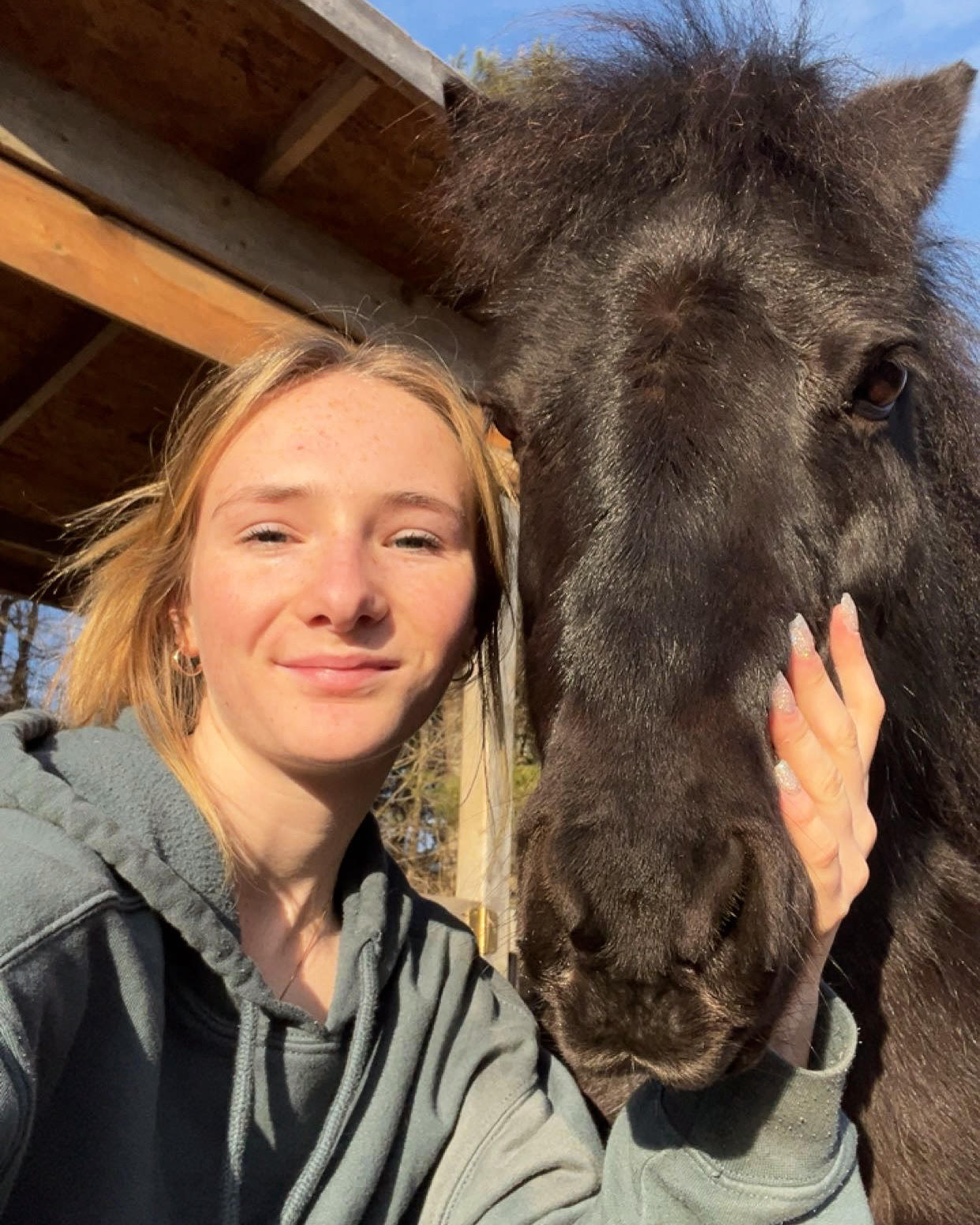 Lucy Furrow with her horse Daisy at the farm